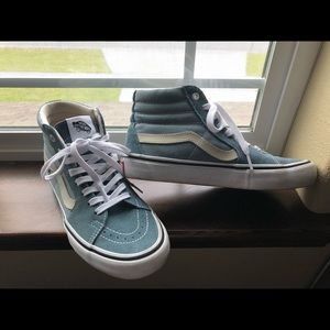 Vans High Top shoes size 6.5 men’s / 8.5 women’s.